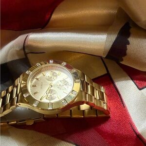 Woman’s Guess Gold Watch with Crystal Details Multifunction U1105BL1 Japan MOV’T